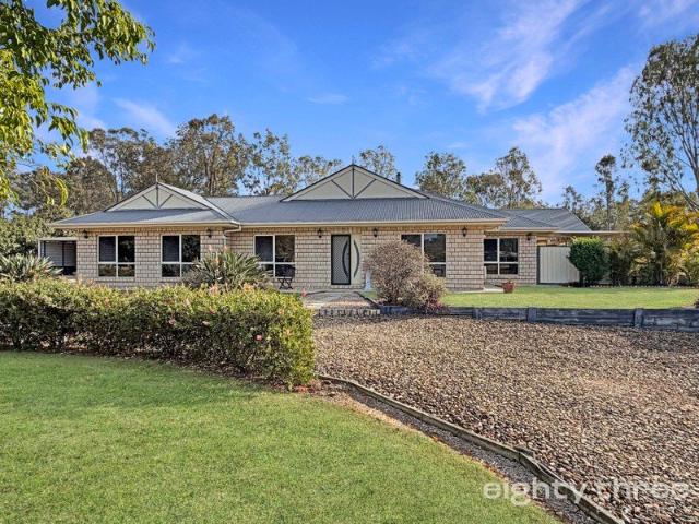 Beautiful Design, Beyond Expectations Acreage Living in The Fairways Estate
