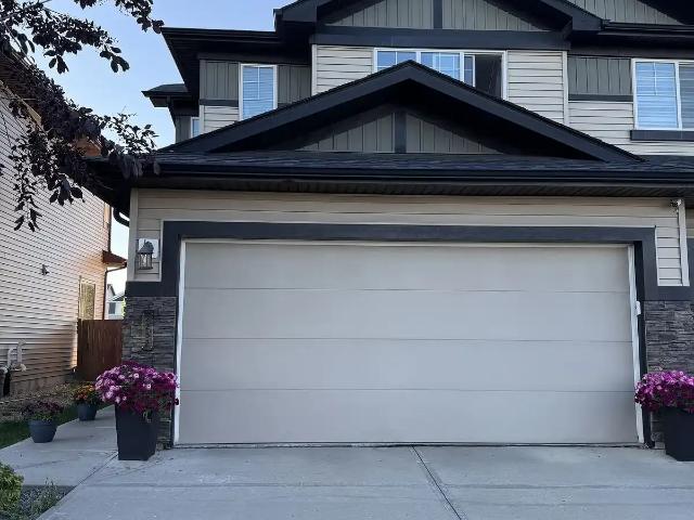 Beautiful Duplex with Double Car GARAGE — 3 Bedrooms+ Den Duplex