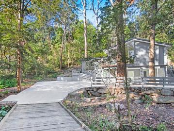 Beautiful Family Home In Uniquely Private Setting With Ample Parking