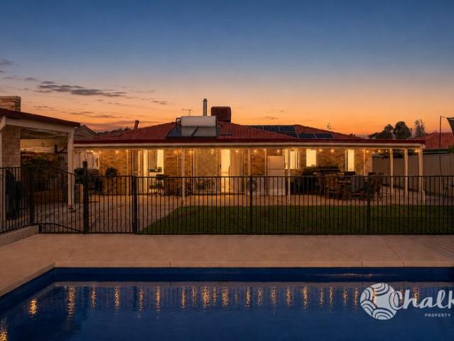 Beautiful family home with all the essentials, pool, side access, workshop