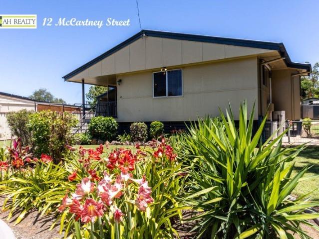 BEAUTIFUL FAMILY HOME WITH DOUBLE BAY SHED & STUNNING OUTDOOR AREA!