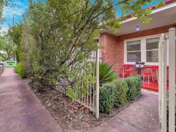 BEAUTIFUL HOME UNIT WITH 2 YARDS & CARPORT