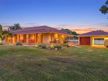 Beautiful homestead with a great shed on one acre in popular Allora!