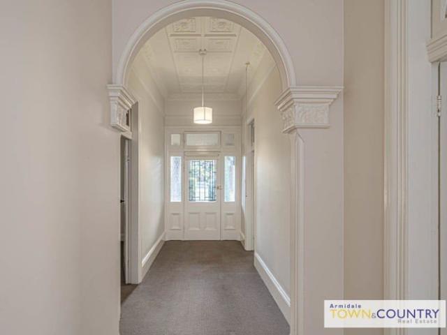 Beautiful Heritage 5 Bedroom, 2 Bathroom Home with Multiple Living Areas  Close to town! Lawn Maintenance included!