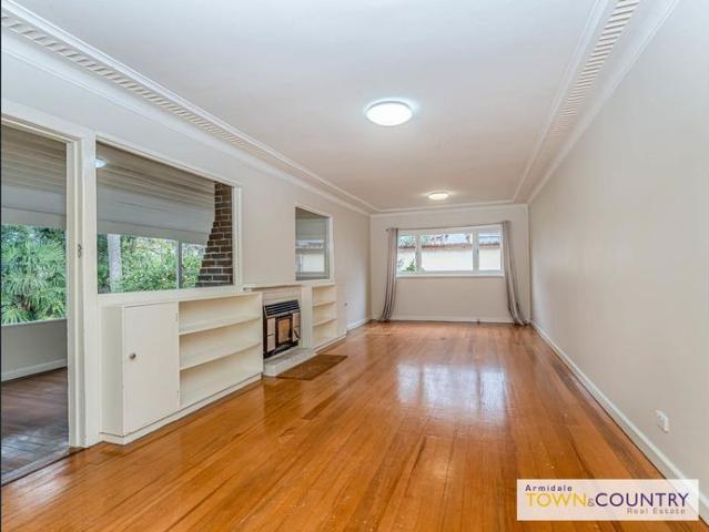 Beautiful Heritage 5 Bedroom, 2 Bathroom Home with Multiple Living Areas  Close to town! Lawn Maintenance included!