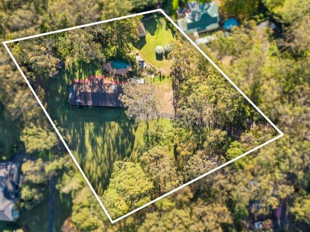 Beautiful low maintenance single level acreage with additional studio!