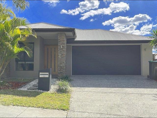 BEAUTIFUL MODERN HOME IN A SORT AFTER ESTATE IN SPRINGFIELD LAKES