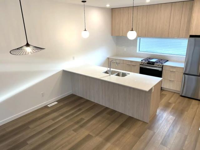 Beautiful Main Floor unit on tree lined street