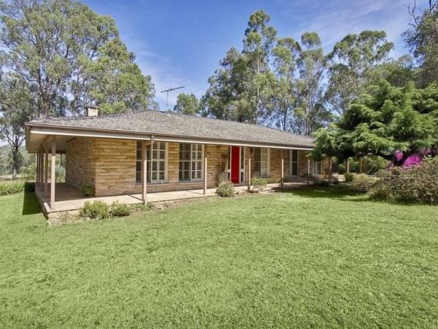 Beautiful Sandstone Full Brick Home on Approximately 3 Acres