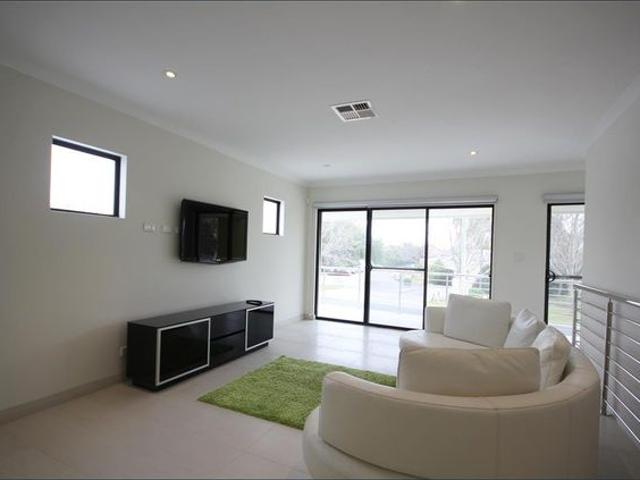 BEAUTIFUL TOP LEVEL 3 BEDROOM FURNISHED APARTMENT