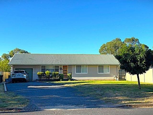 Beautiful, tidy home with large backyard, 3 bay shed & ultimate Man Cave