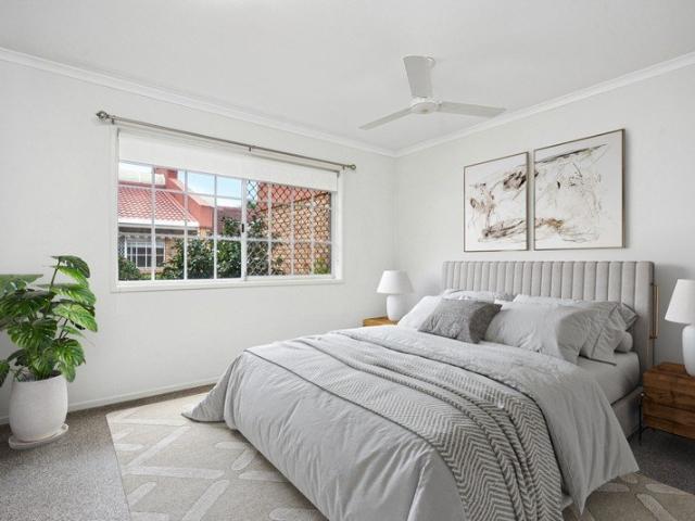 Beautiful two Bedroom villa with sun drenched sunroom featuring one bathroom plus a separate toilet