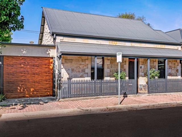 Beautifully updated bluestone symmetrical cottage in the heart of Parkside