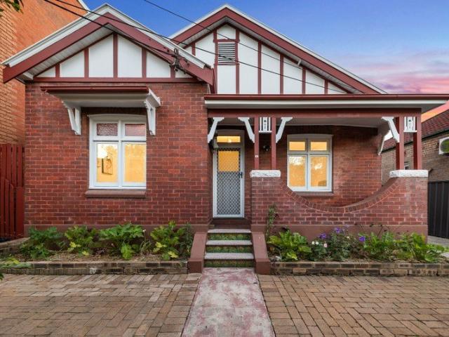 Beautifully Updated Full Brick Family Home with Exceptional Backyard