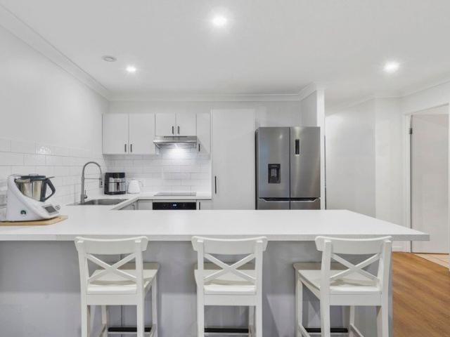 Beautifully Updated Lowset Home with a Double Garage