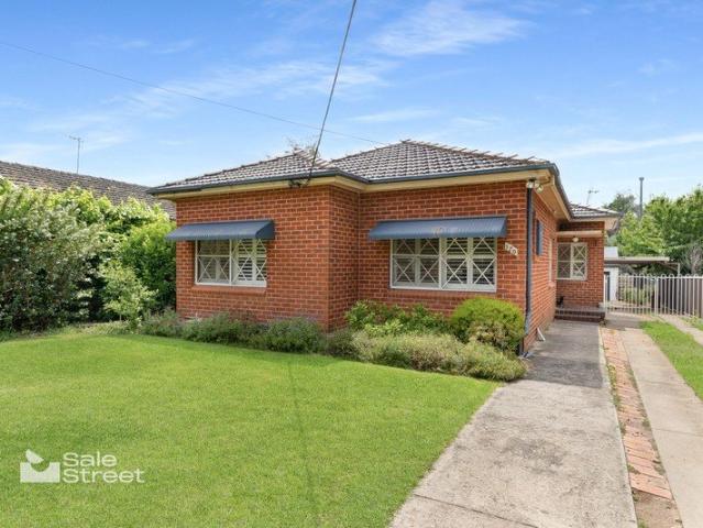 Beautifully Updated Red Brick Classic