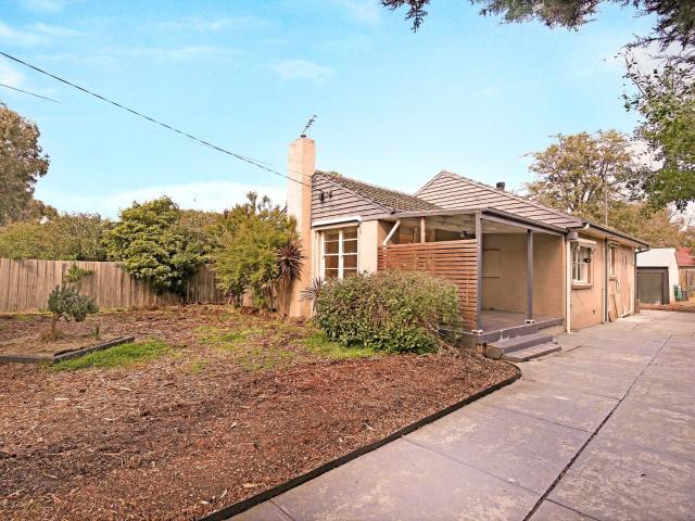 Beautifully Updated Three Bedroom Family Home with Outdoor Studio!