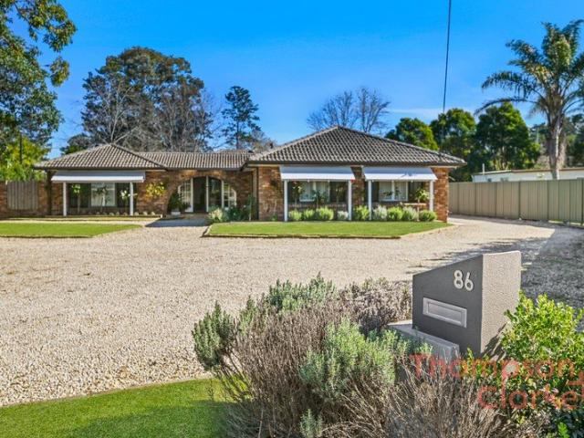 Beautifully Updated 6 Bedroom Bolwarra Family Home with Pool, Shed & Stunning Gardens