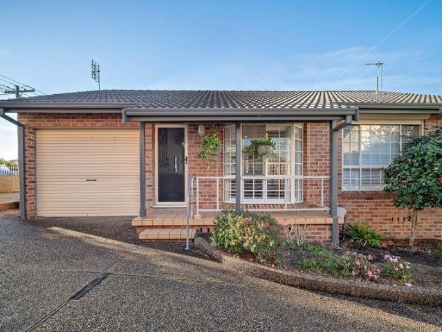 Beautifully Appointed Sanctuary with Stunning City and Coastline Views