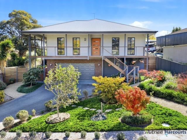 Beautifully Crafted Elevated Home with Breathtaking Views & Edible Gardens