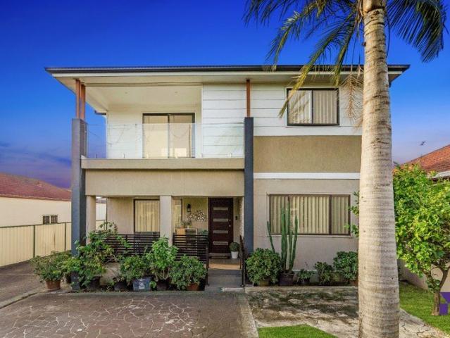 Beautifully designed five bedroom home with private outdoor entertaining