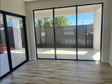 Beautifully Designed Near New Modern Home with Low Maintenance Yard
