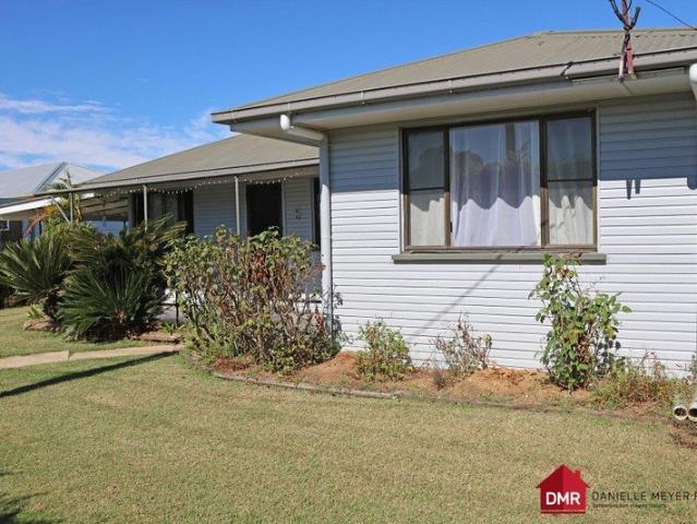 BEAUTIFULLY MAINTAINED FAMILY HOME IN A PEACEFUL MUNDUBBERA LOCATION