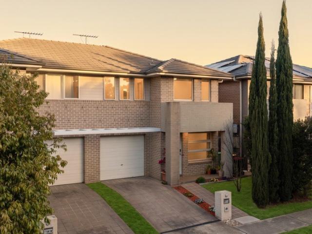Beautifully Maintained Home with a Spacious Family Backyard