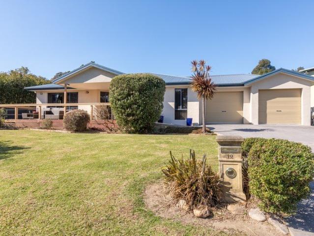 Beautifully Maintained Single Level Home in a Sought After Location