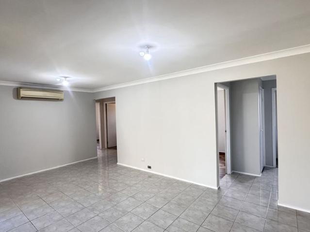 Beautifully Presented 4 Bedroom Home with Large Backyard & Shed