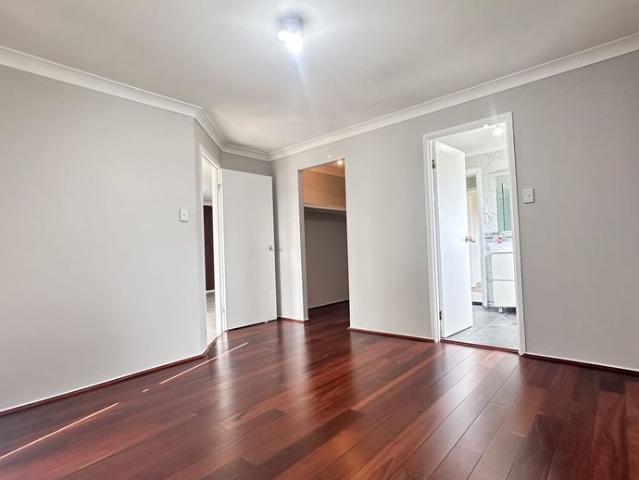 Beautifully Presented 4 Bedroom Home with Large Backyard & Shed
