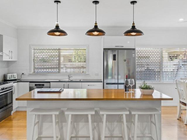 Beautifully presented beachside home on private 973m² block