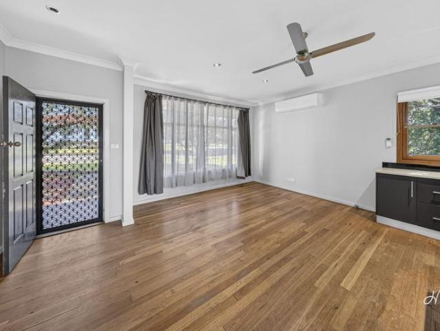 Beautifully Presented Kitchen, Polished Timber Floors & a Deck Made for Entertaining — Move In Ready in Rutherford