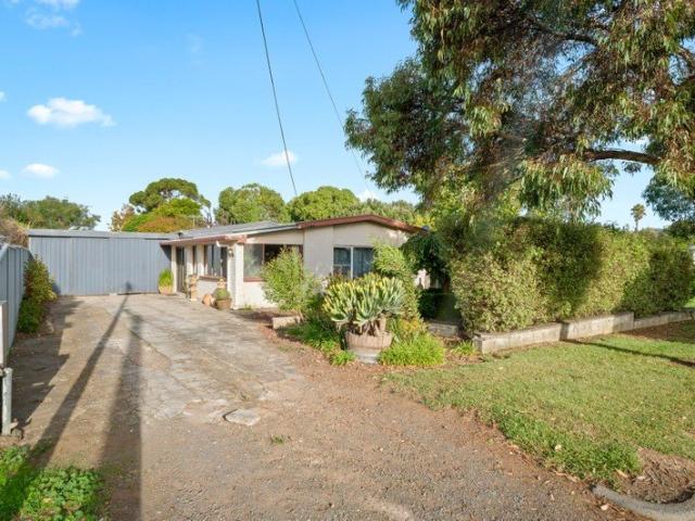 Beautifully Presented Home Surrounded by Established Gardens