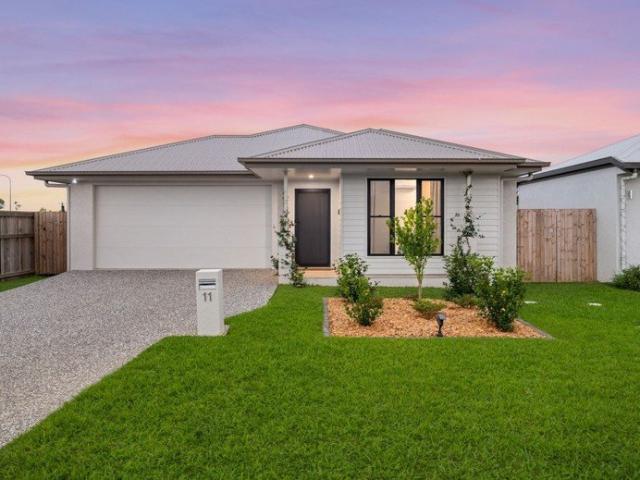 Beautifully Presented in Buttonwood Court! Modern Four Bedroom Home in Rasmussen!