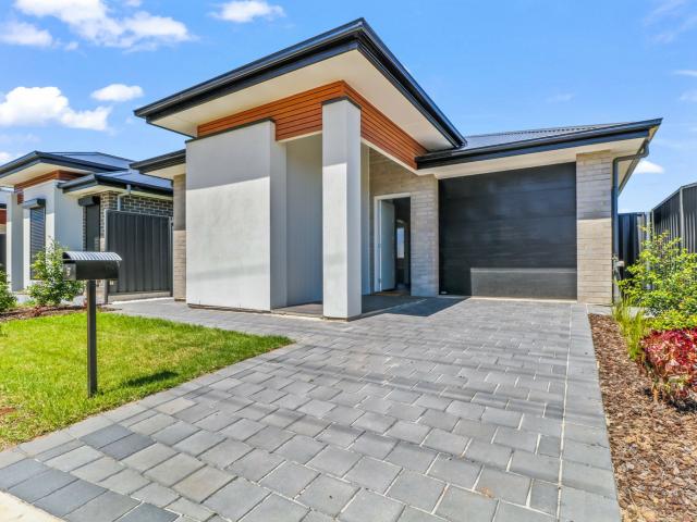 Beautifully Presented Near New Home