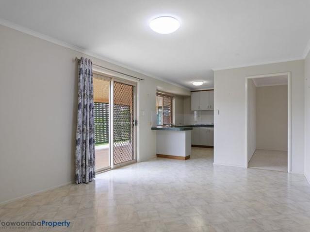 BEAUTIFULLY PRESENTED with 2 air cons and 3 living areas!