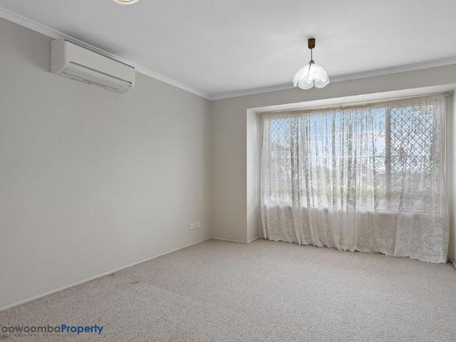 BEAUTIFULLY PRESENTED with 2 air cons and 3 living areas!