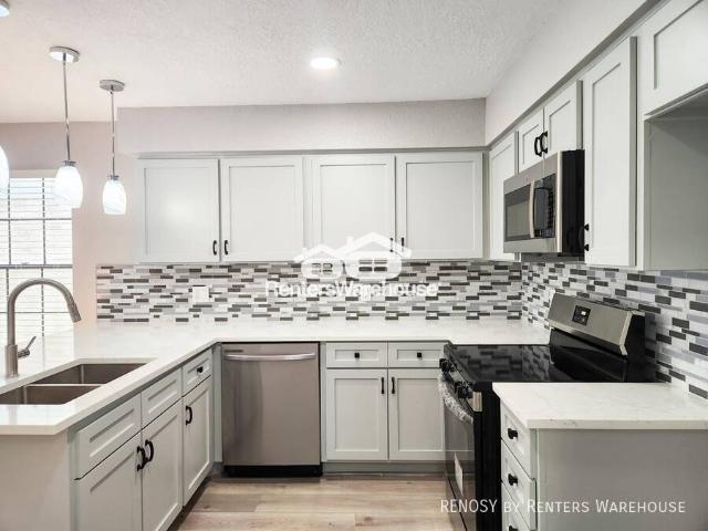 Beautifully remodeled 3 bedroom, 2 bath townhome that's truly move in ready!