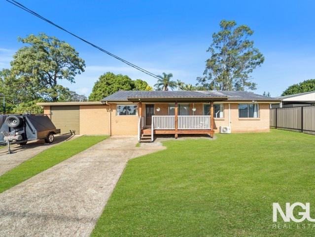 Beautifully Renovated 3 Bedroom Home Presenting in Immaculate Move In Condition!