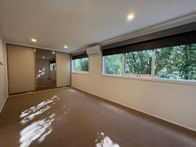 Beautifully Renovated 3 Bedroom Home with Versatile Sunroom and Large Shed