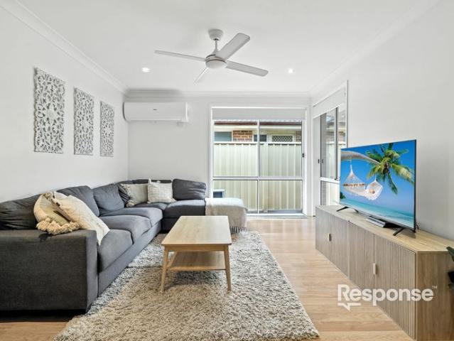 Beautifully renovated 4 bedroom home in prestigious Glenmore Park!