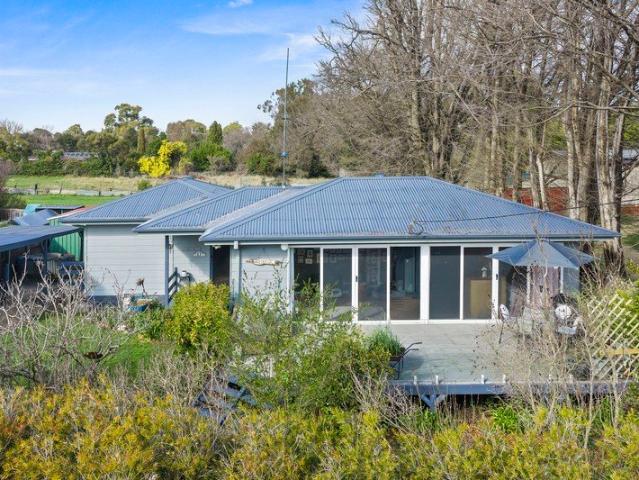 Beautifully Renovated Cottage in a Prime Village Setting