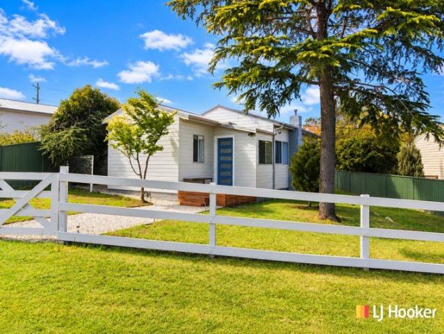 Beautifully Renovated Clad Home with Style & Charm