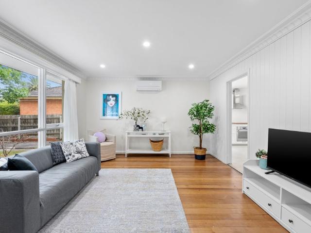Beautifully renovated and filled with warmth, a charming three bedroom home