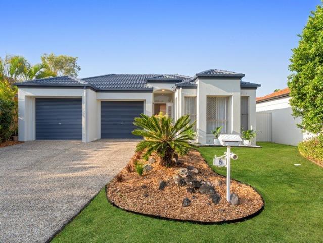 Beautifully renovated and ready for your next chapter of relaxed coastal living in sought after community