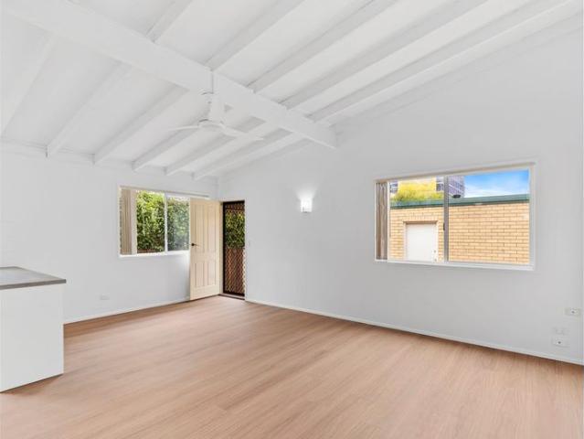 Beautifully Renovated Ground Floor Unit Just Moments from Margate Beach