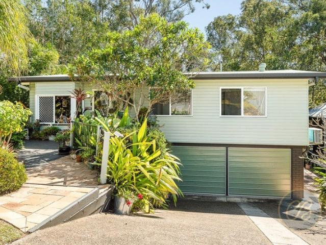 Beautifully Renovated Family Home with Dual Living & Tranquil Bushland Outlook