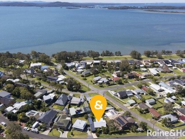 Beautifully Renovated Home with Dual Living & Water Views