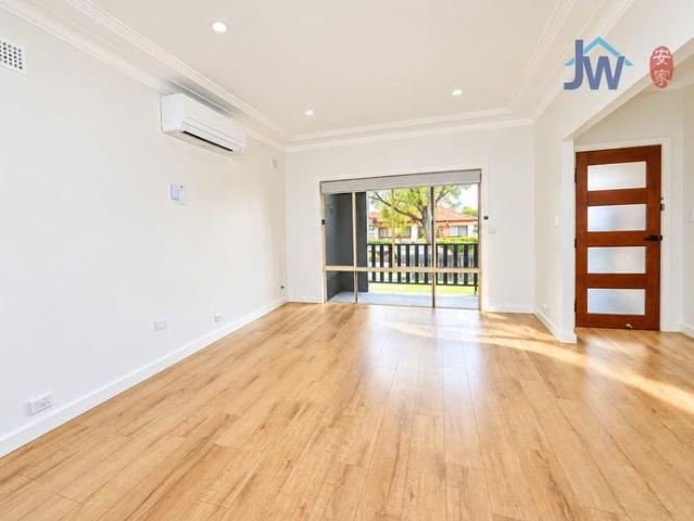 Beautifully Renovated Home with Large Garage & Spacious Backyard